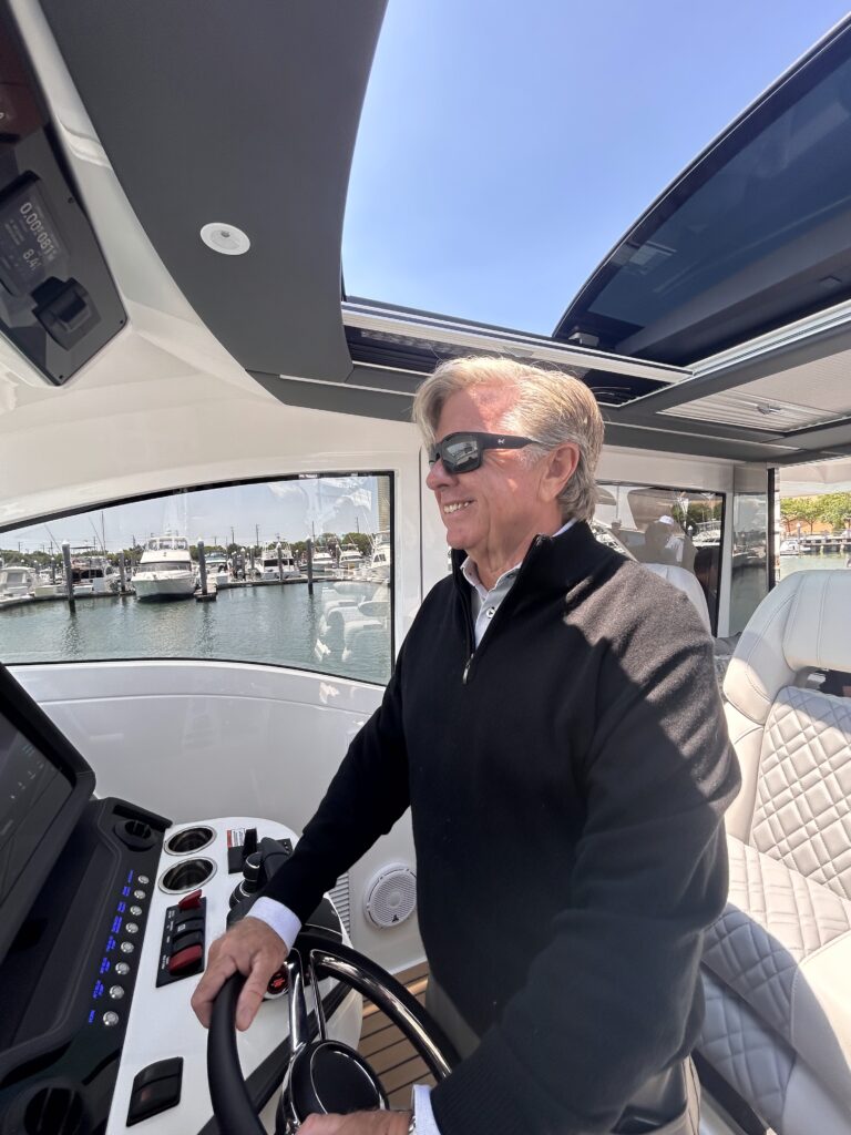 Pat Healey, president and CEO of Viking Yachts, at the helm of the new Valhalla 55 SY.
