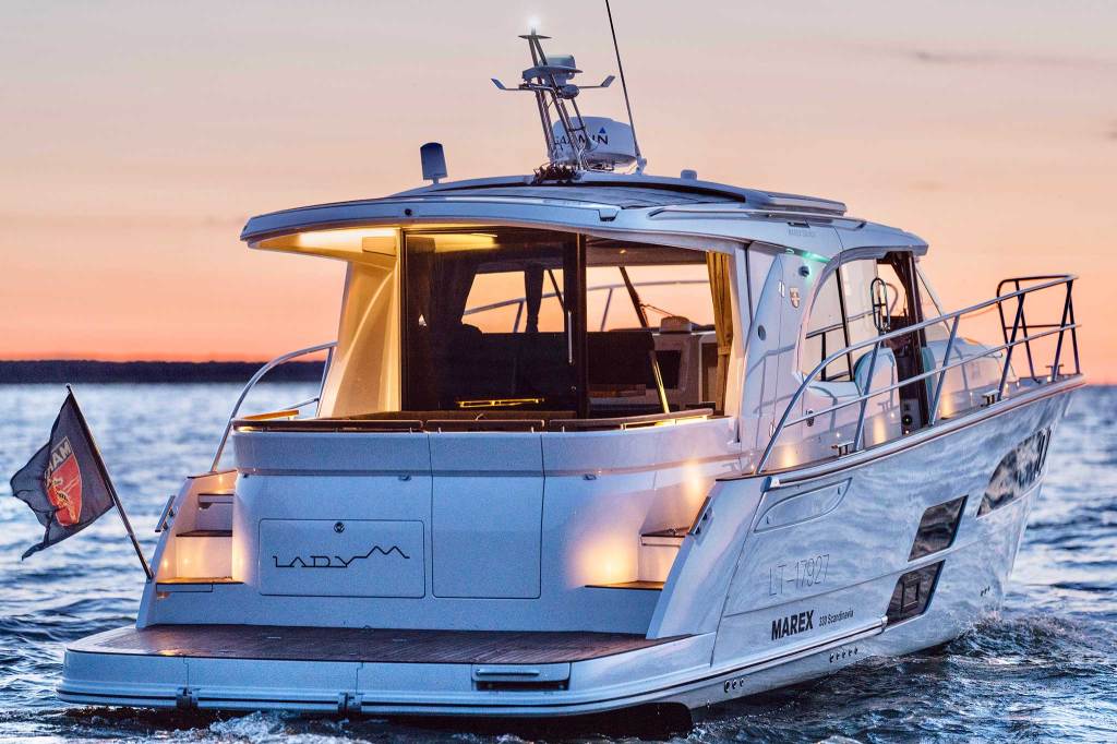The stern end of a motor boat showing the platform