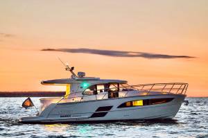 Amotor boat at sunrise/sunset on the water