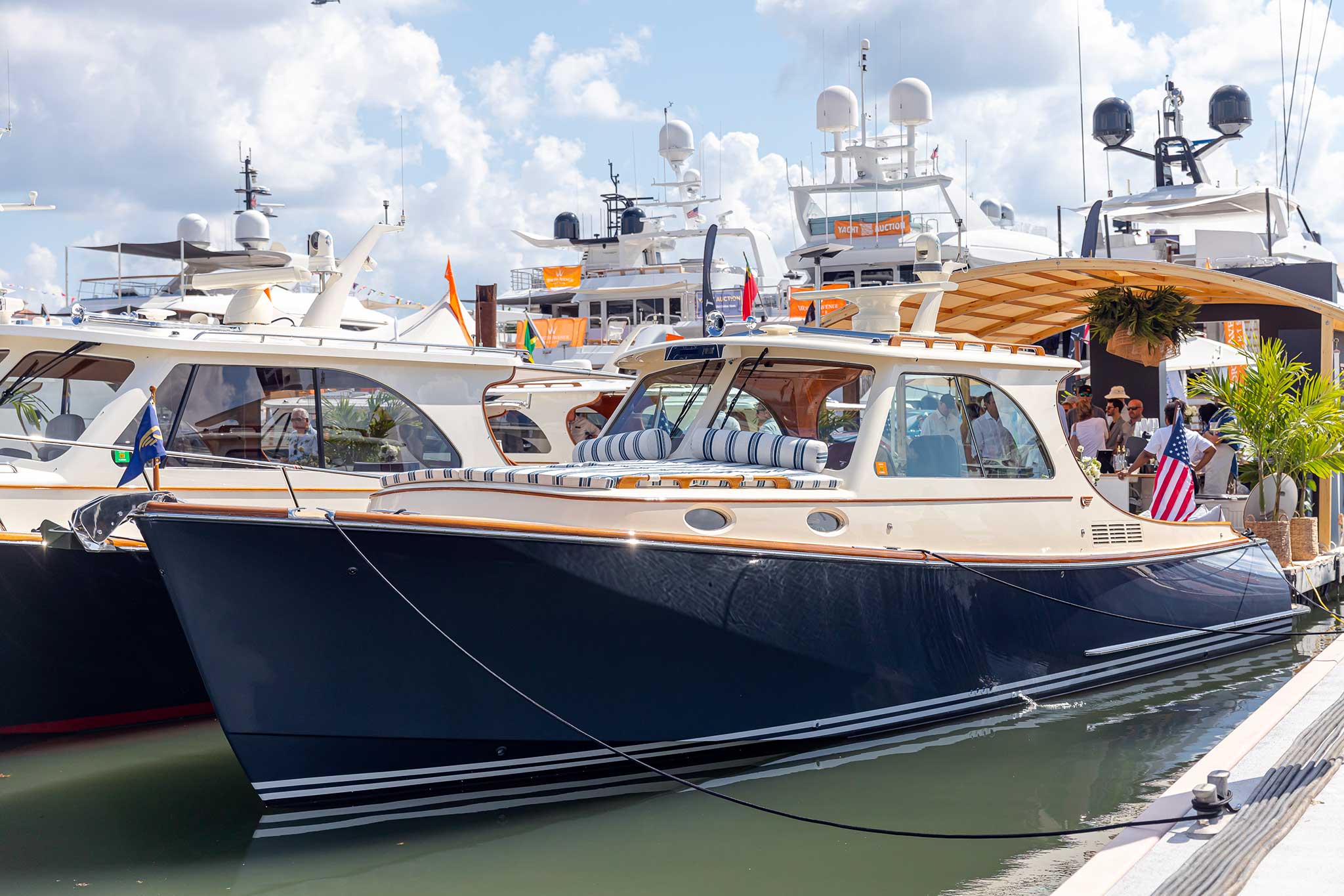 Exterior side view of a blue Hinckley boat