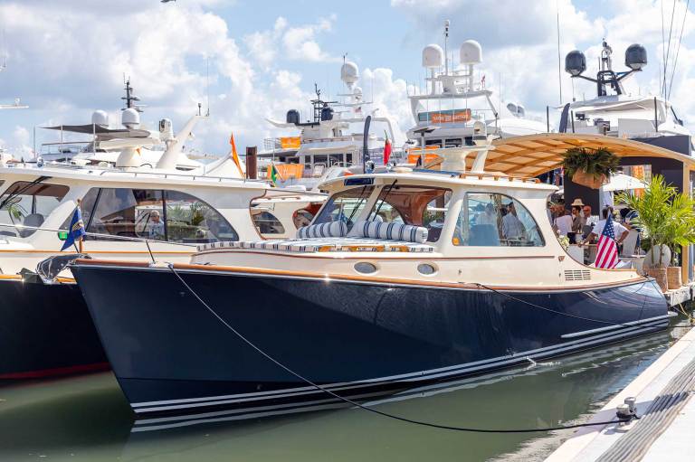 Exterior side view of a blue Hinckley boat