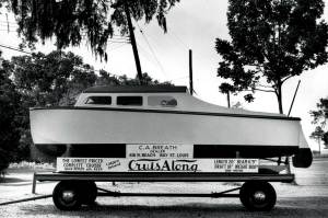 black and white photo of a plywood boat
